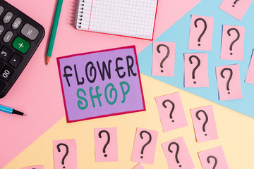 Handwriting text Flower Shop. Conceptual photo where cut flowers are sold with decorations for gifts Mathematics stuff and writing equipment above pastel colours background