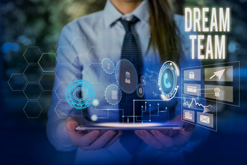 Writing note showing Dream Team. Business concept for Prefered unit or group that make the best out of a demonstrating Woman wear formal work suit presenting presentation using smart device