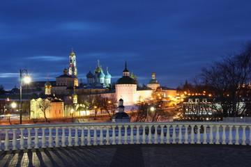 Fototapeta na wymiar Sergiev Posad Moscow area, famous Troitse Sergieva lavra church and observation deck fence in winter night view, landmark of Russian Golden Ring