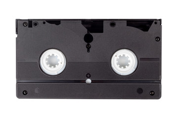 Single old vintage black blank VHS video cassette isolated on white, back side. Retro technology, vcr, outdated obsolete vhs tape, tech items from the 80s and 90s. One videotape on white, hq closeup