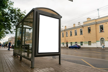 vertical billboard for a poster, standing in the city at a stop of the public transport