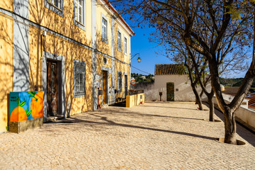 Picturesque cobbled square in Silves old town, Algarve, Portugal