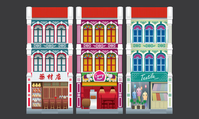 Colorful and historical colonial style three storey shophouse. Isolated. Caption: traditional herbal shop (left). 