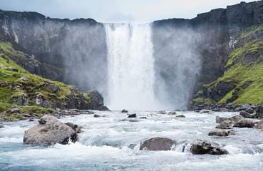 Beautiful view of Gufufoss, a waterfall in Seydisfjordur, Iceland