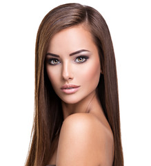 Fototapeta premium Portrait of Beautiful young woman with long straight brown hair.