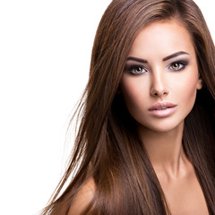 Portrait of Beautiful young woman with long straight brown hair.