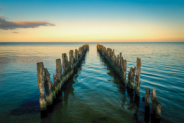 Old wooden pier in the sea