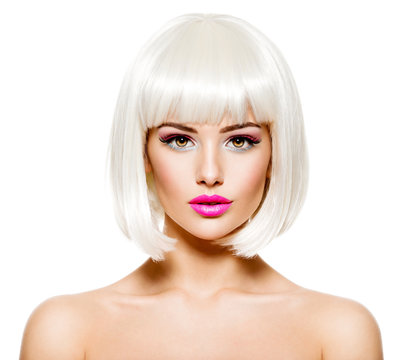 Face of a fashion model with bright pink make-up and bob hairstyle