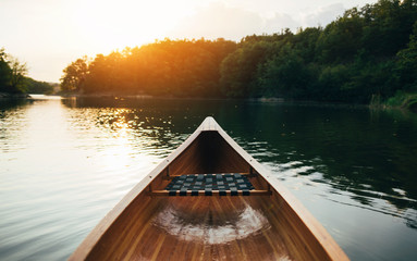 Canoe bow seat and deck on the sunset lake