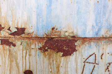 Metal texture with scratches and cracks which can be used as a background