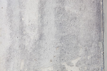Obraz premium Texture of a concrete wall with cracks and scratches which can be used as a background
