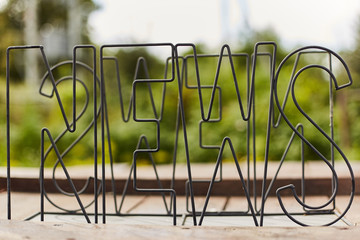 Lettering News made of wire in nature.
