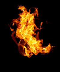 Fototapeta premium Fire flames on a black background