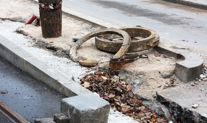 hatches repairing road unsecured sewer manhole in street