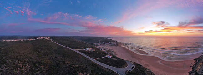 Fototapeta premium Panorama aerial from Monte Clerigo at the west coast in Portugal at sunset