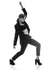 posing girl in a dark suit