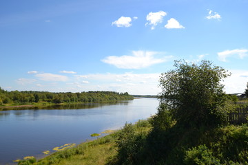 Fototapeta na wymiar Beautiful northern summer landscape: Colva river flow beside Pokcha town