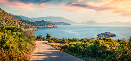 Road to Ierussalim Beach. Picturesque morning seascape of Ionian sea. Impressive sunrise on...