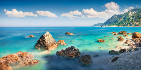 Panoramic spring view of Avali Beach. Marvelous morning seascape of Ionian sea. Romantic outdoor...