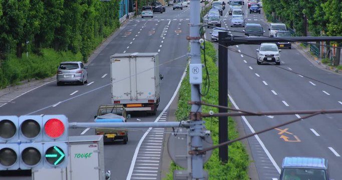 A downtown street at Kanpachi avenue in Tokyo daytime