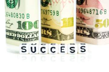 closeup  of american dollars in the shape of blocks in all denominations, success concept