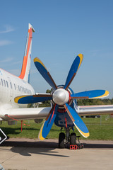 A colorful blue and yellow airplane valve - an outdoors airplane exposition