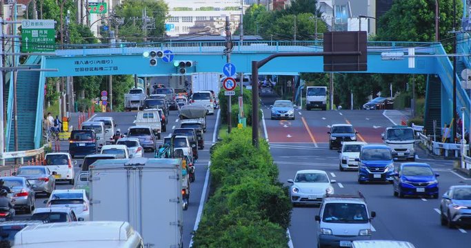 A downtown street at Kanpachi avenue in Tokyo daytime