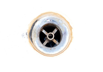 Close-up rusty dirty water Drain isolated on White Background
