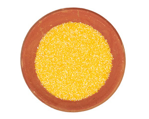 Maize Flour Background Texture in Red Terracotta Plate