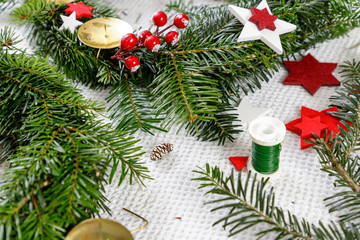 Decoration of handmade red and white advent christmas wreath from fir