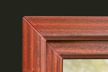 Fragment of a new plastic window with lamination