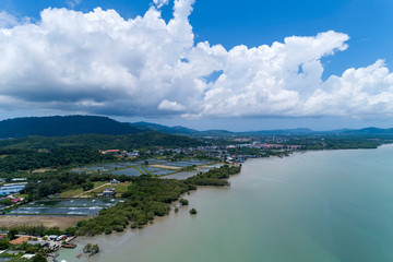 Aerial drone bird's eye view photo of tropical sea with Beautiful island at phuket thailand