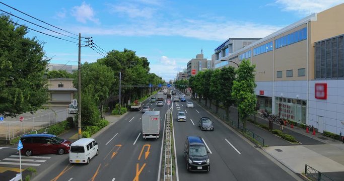 A downtown street at Kanpachi avenue in Tokyo daytime