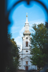 Old Orthodox church with a metal cross, beautiful sky