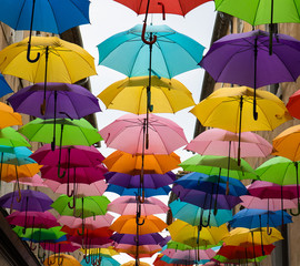Fototapeta na wymiar Carcassonne colorful street umbrellas