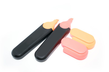 Photo of colored markers, stationery on a light background.