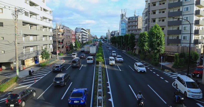 A downtown street at Kanpachi avenue in Tokyo daytime