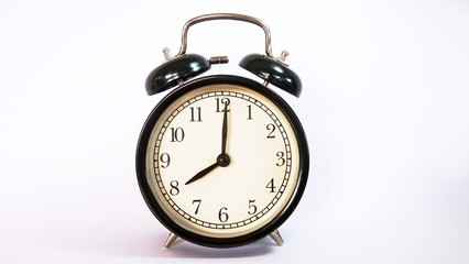 old alarm clock isolated on white background