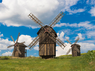 Fototapeta premium View of wooden windmills. Village Vodianiki, Cherkasy region, Ukraine