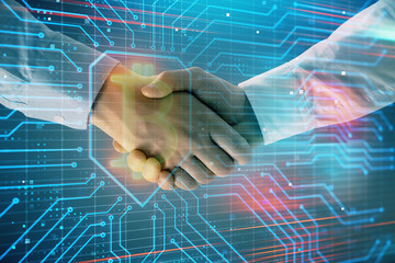 Multi exposure of bitcoin sign on abstract background with two men handshake. Concept of...