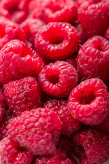 Fresh and sweet raspberries background