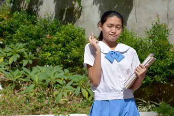 Lucky Young Filipina Girl Student With School Books