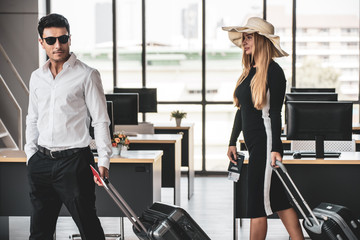 Employee in office ready to travel on summer vacation and celebrating the summer holidays. Attending summer festivals, celebrating the summer Concept.