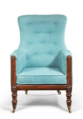 Antique arm chair light blue upholstery isolated on white background