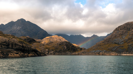 The Cuillin Mountains on Skye Island Scotland seen from boat