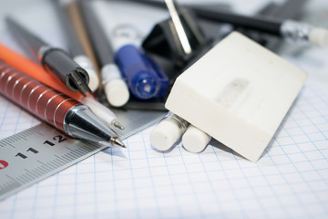 Photo of office supplies on the office desk.