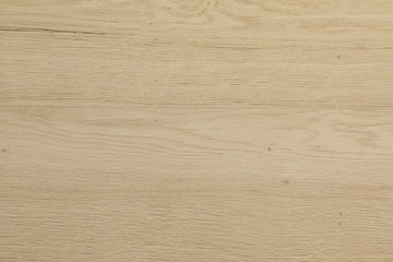 Flatlay of bass-wood laminate floor covering of flaxen color