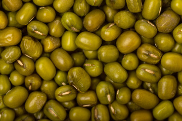 Macro image of green mung beans as natural food background.