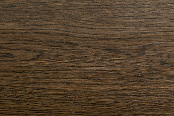 Dark brown wood texture close-up with fibre and natural pattern for design background