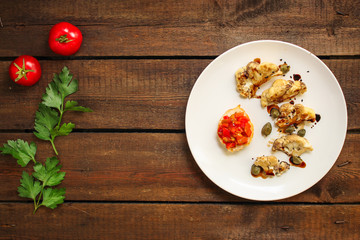 cauliflower grilled (fried grill vegetables or snack salad, bruschetta with tomato) menu concept. food background. copy space. Top view